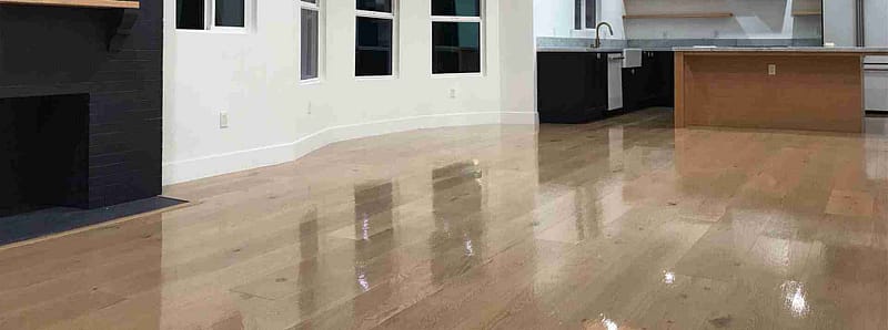 a photo of a hardwood flooring refinishing job in a Los Angeles kitchen